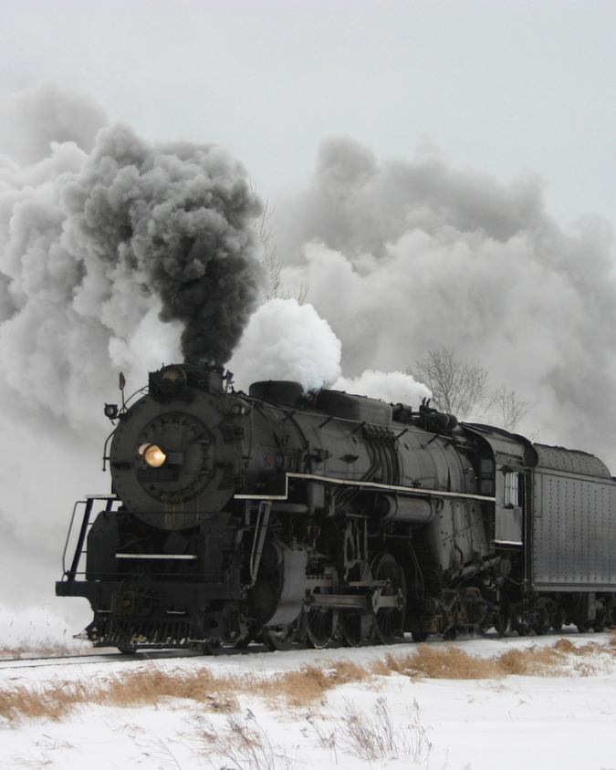 Photo of a steam locomotive.