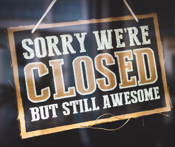 Photo of a sign that says sorry we are closed by still awesome.